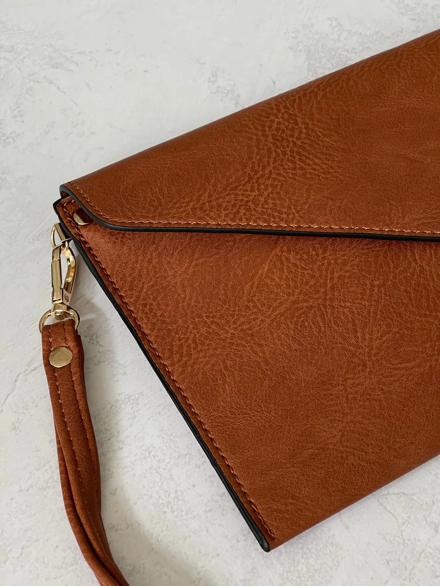 BROWN OVER-SIZED ENVELOPE CLUTCH BAG WITH LONG CROSS BODY AND WRISTLET STRAP